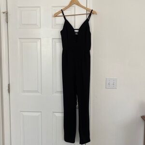 Y2K French Atmosphere black jumper with low cut neckline.